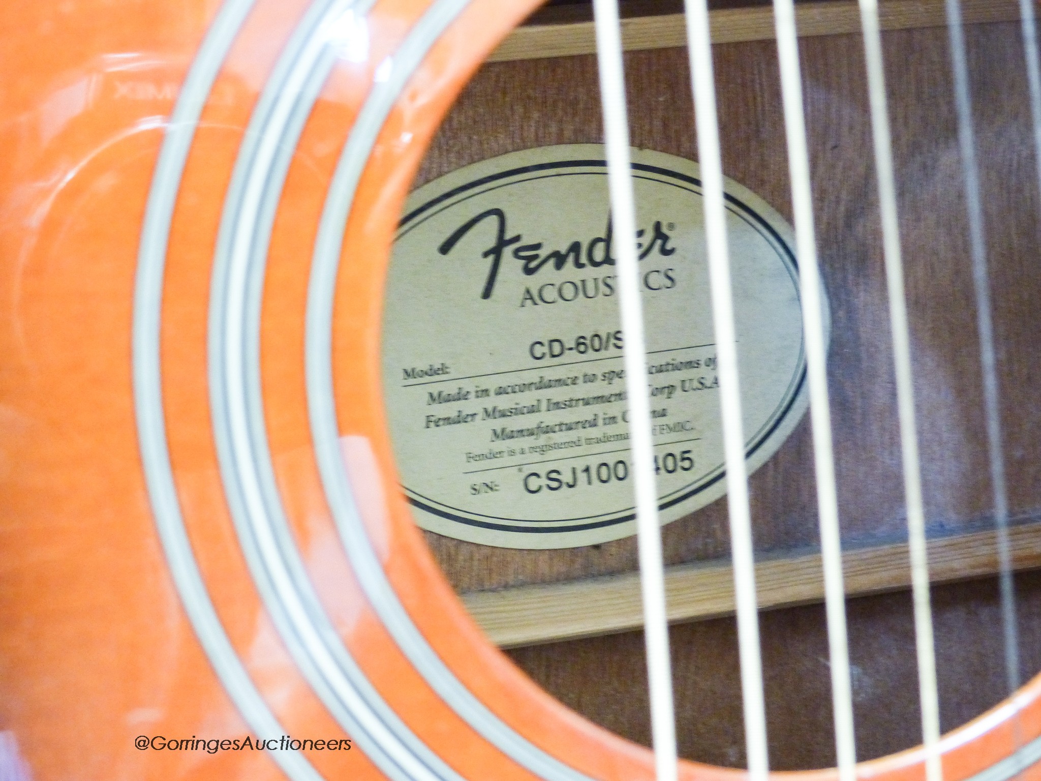 A fender acoustic guitar CD 60/5B